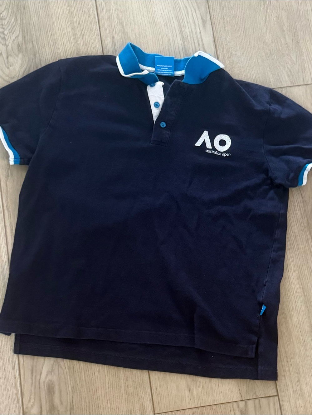 Womens Navy Polo with Blue Trim from Australian open sz large runs small fits m